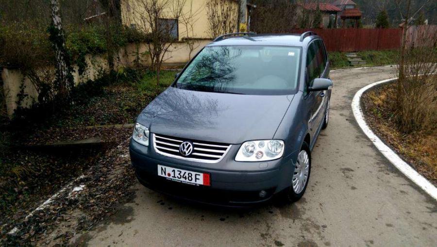 84937498_8_1000x700_vw-touran-2005-16-benzina-fsi-6-trepte-116cp-euro-4-impecabil-.jpg
