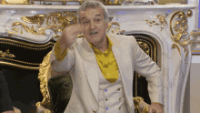 becali-versace.gif.161631e304532d7c865cbcec726d79f2.gif
